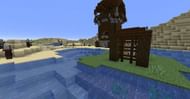 An Iron Golem trapped in a cage near a Pillager Outpost (Image via Minecraft)